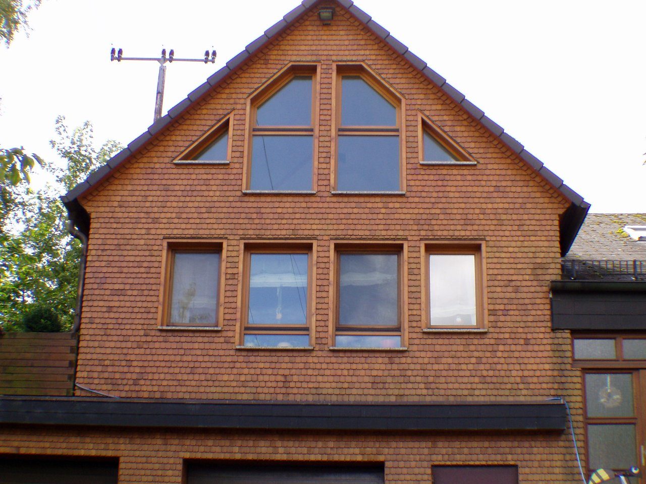 Holzschindel Fassade Beispiel Referenz