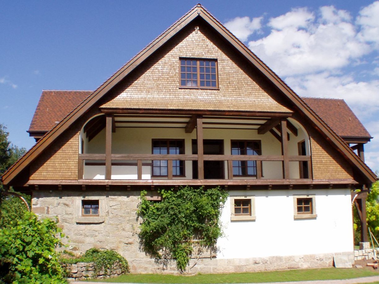 Beispiele Holschindel-Fassaden