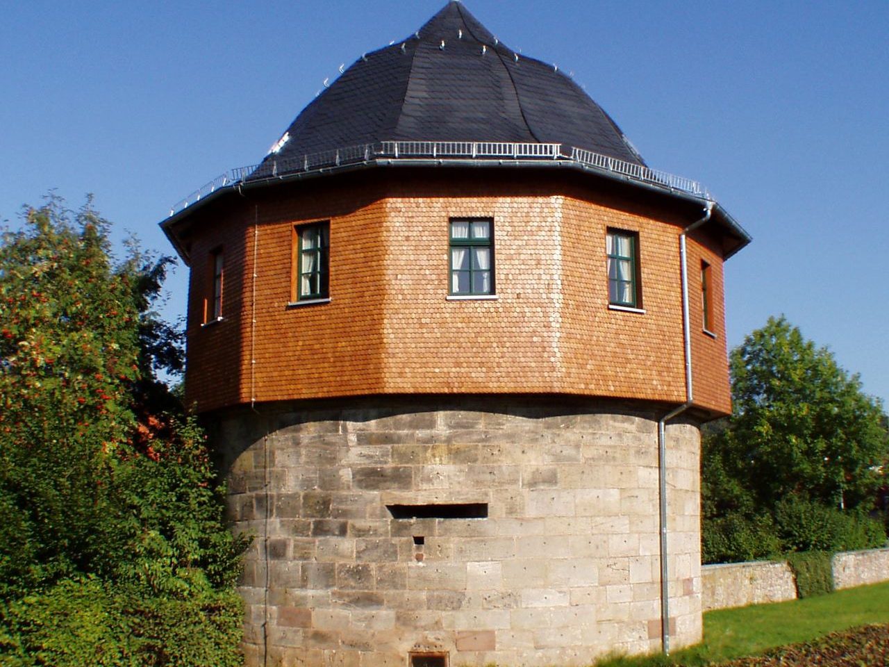 Beispiele Holschindel-Fassaden